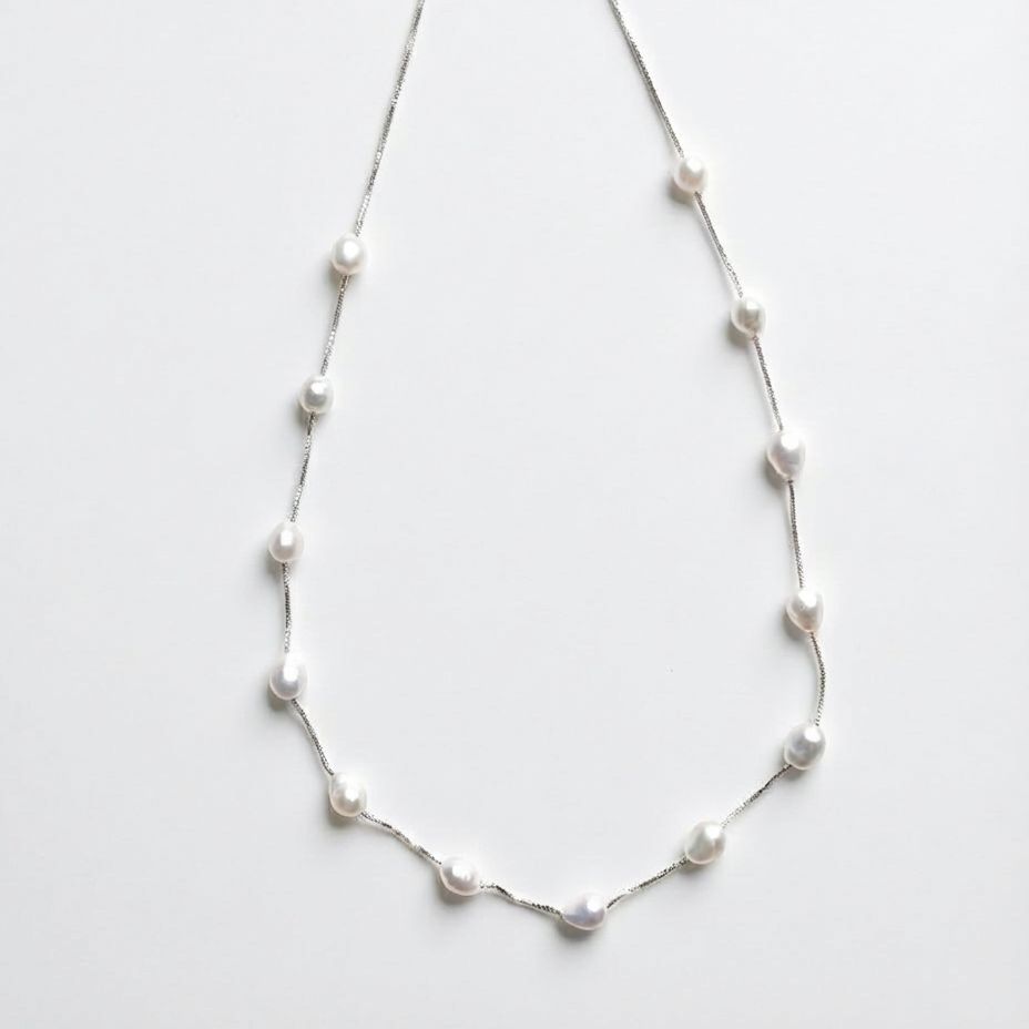 Pearl necklace on a white background