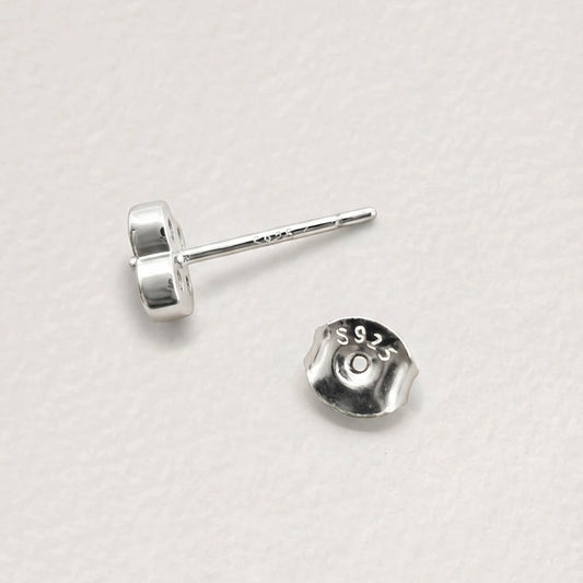 Back view of Clover Shine stud earring in silver finish showing the post and butterfly back