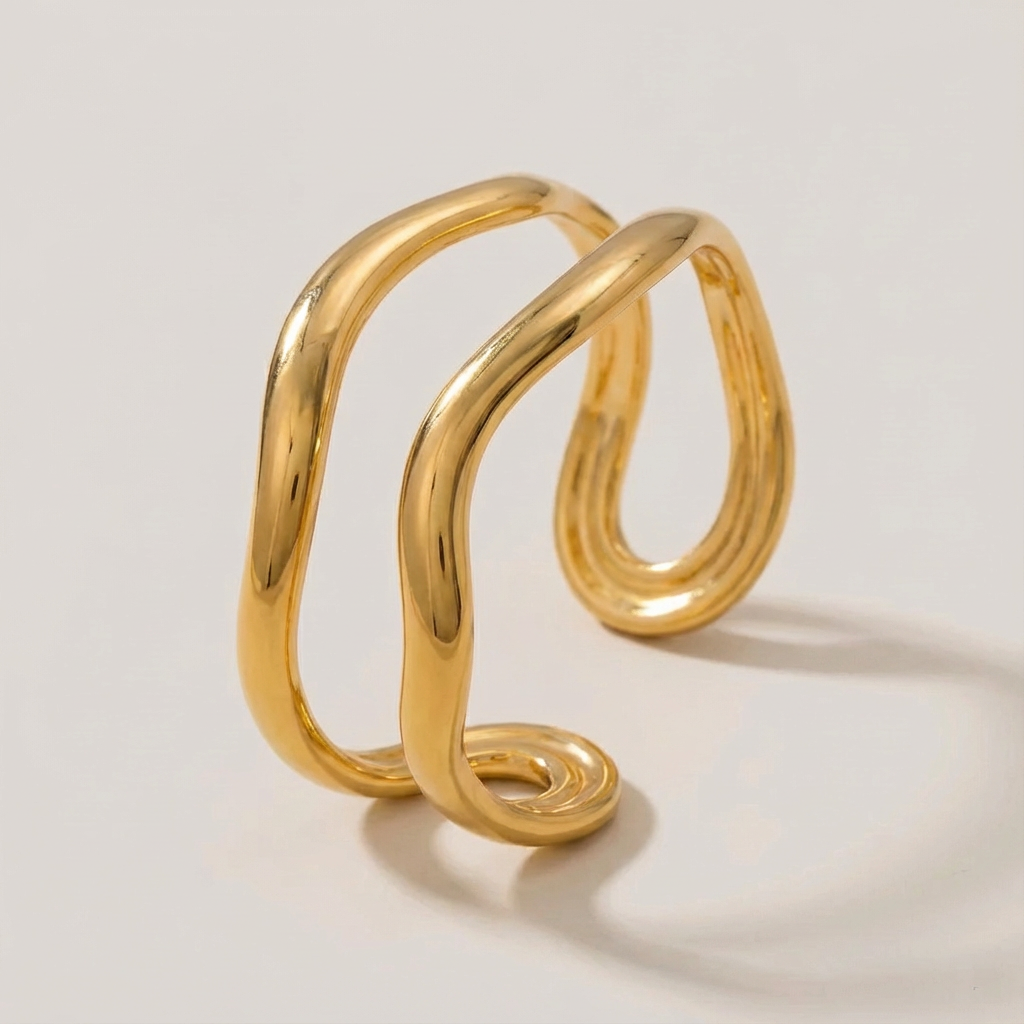 The Golden Wave · Polished Hammered Hollow Cuff