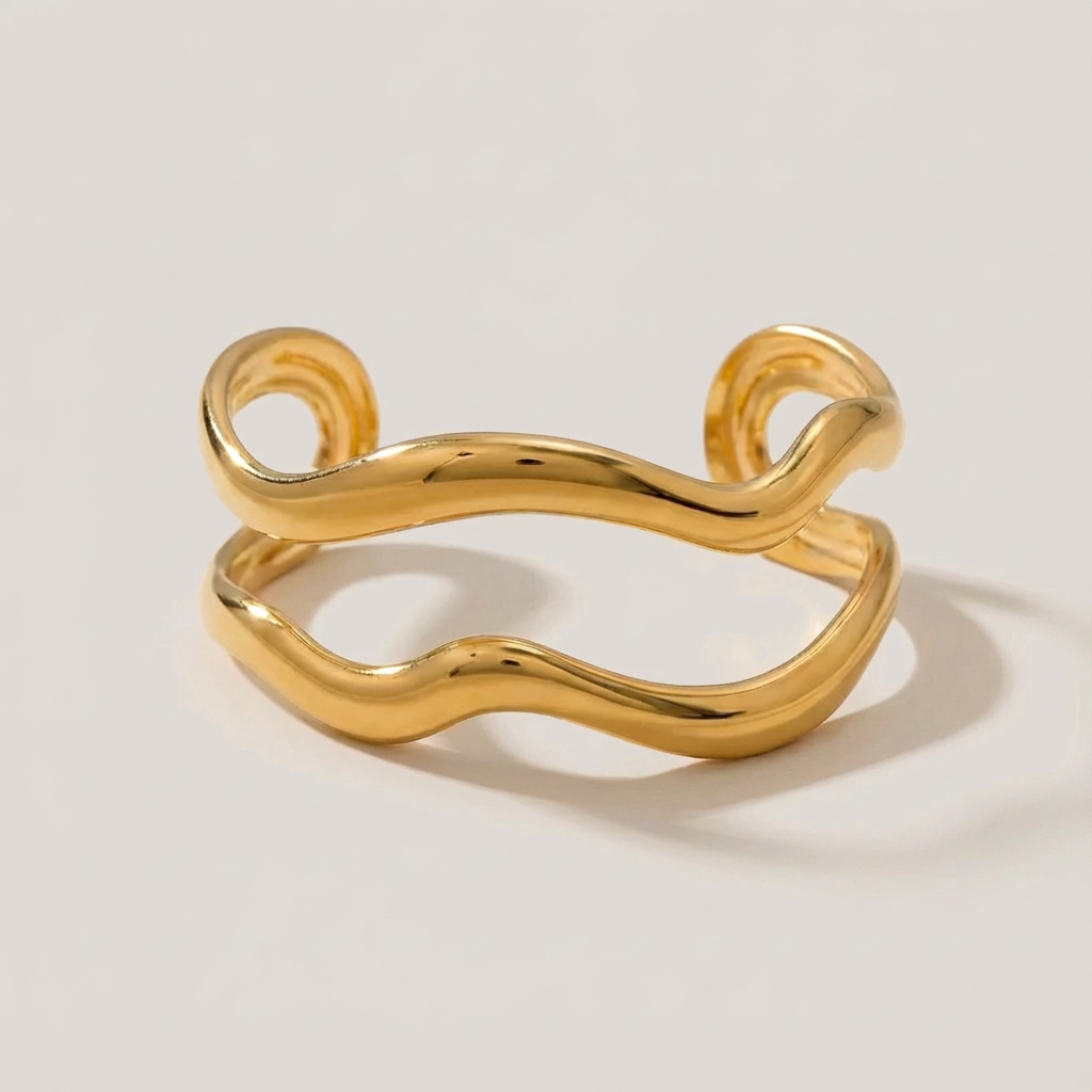 The Golden Wave · Polished Hammered Hollow Cuff