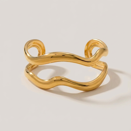 The Golden Wave · Polished Hammered Hollow Cuff