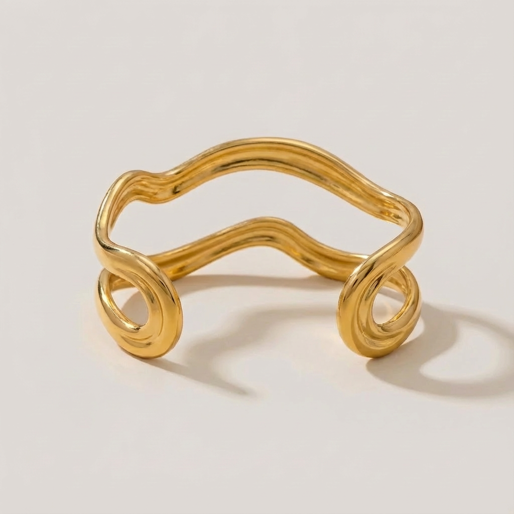 The Golden Wave · Polished Hammered Hollow Cuff