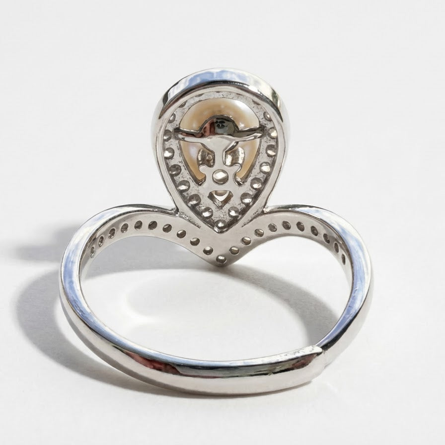 Back detail of The Sovereign Glow pearl tiara ring showing the open band and underside of the pearl setting