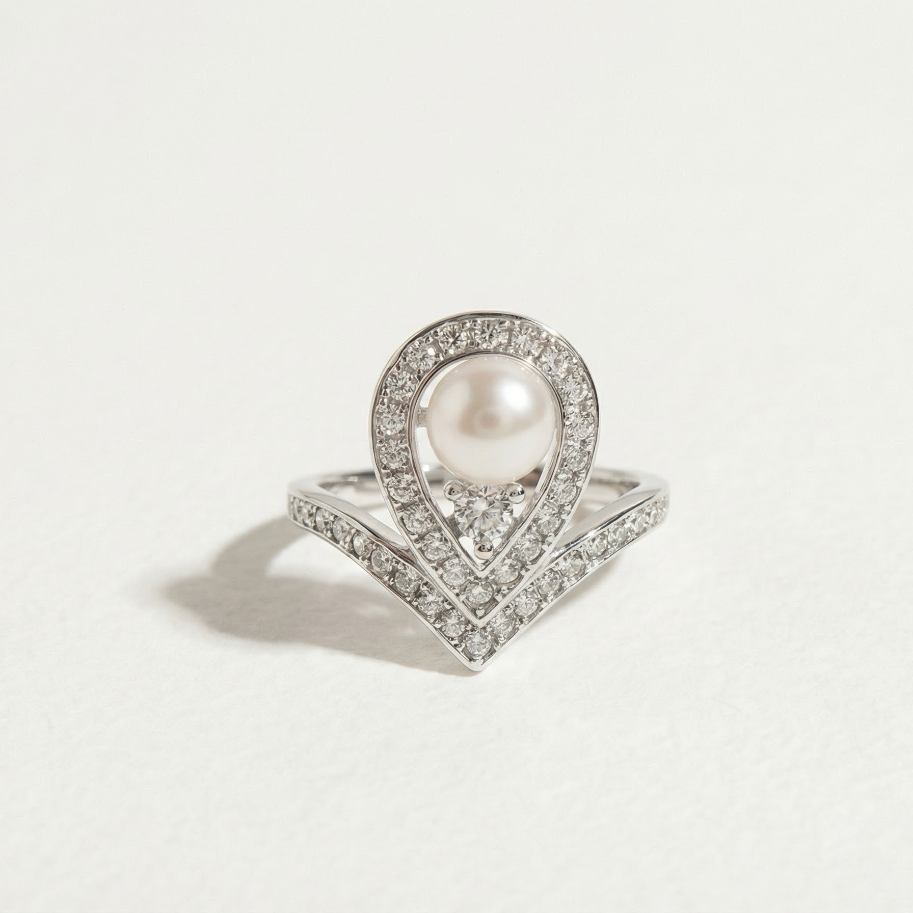 The Sovereign Glow pearl tiara ring with a freshwater pearl and zirconia shown on a light background
